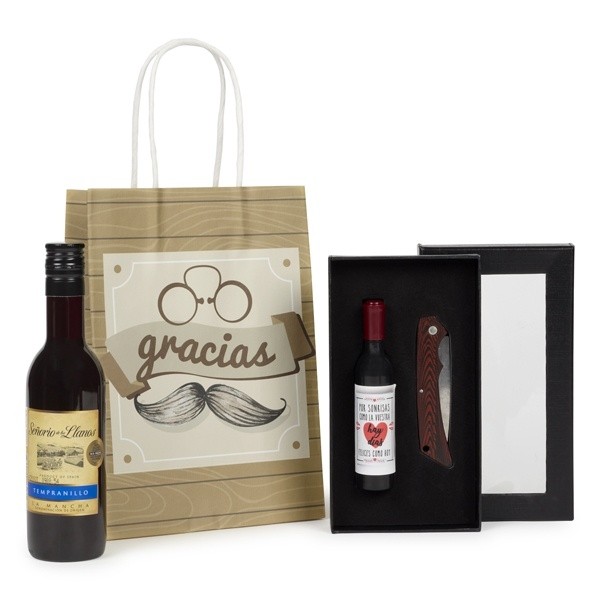 Botellita de vino y estuche con abridor de frases y navaja en bolsa Kraft