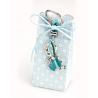 Detalle Bautizo Llavero bebé en columpio azul con peladillas