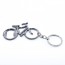 Detalle bautizo llavero abridor bicicleta