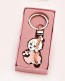 Detalle Bautizo Llavero bebé en columpio rosa con estuche