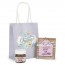 Detalle Bautizo Mini Nutella y llavero frases en bolsa de regalo